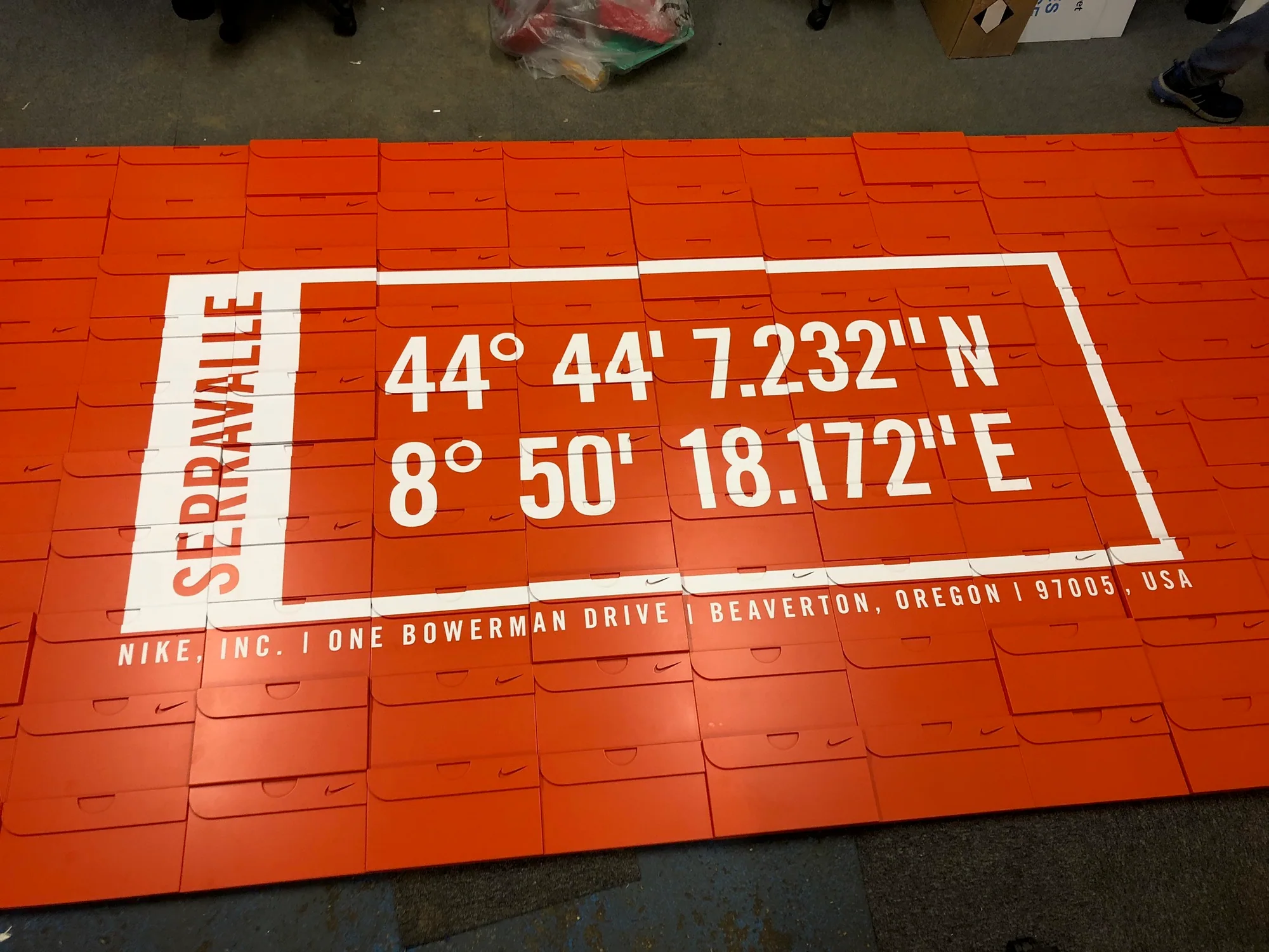 Complete orange Nike Serravalle coordinate feature assembled on the workshop floor