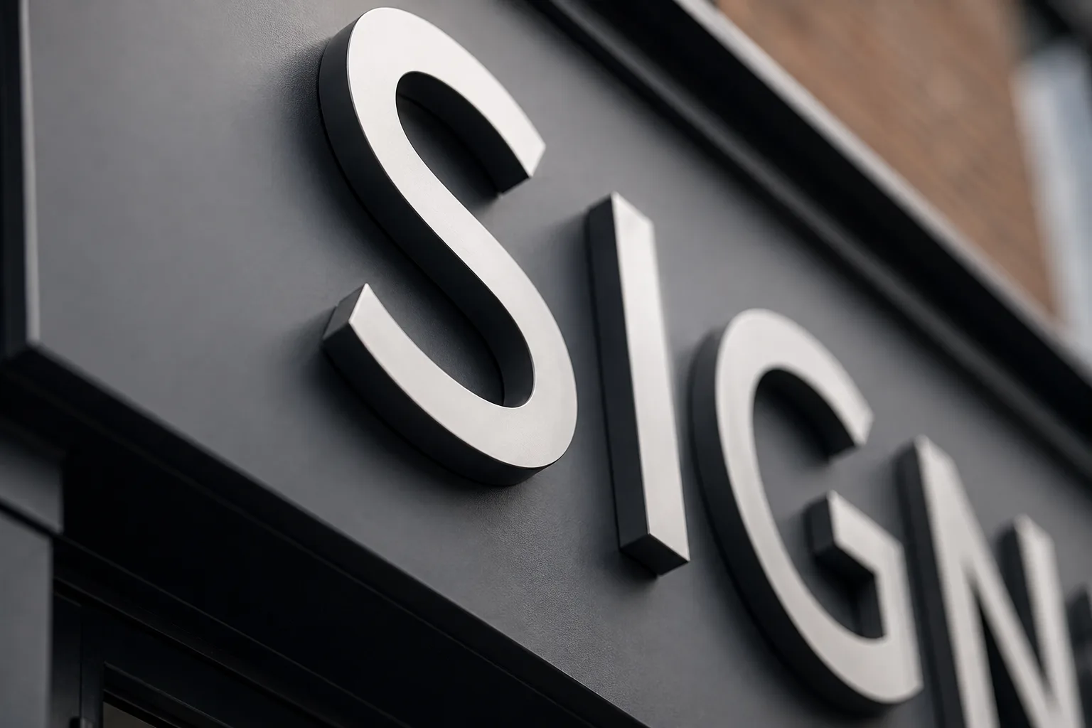 Stainless built-up letters mounted on a dark powder-coated fascia tray